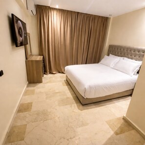 Standard Apartment, 1 Bedroom | Premium bedding, in-room safe, individually decorated, laptop workspace