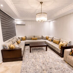 Superior Apartment, 2 Bedrooms | Living area | 42-inch LED TV with satellite channels, TV, DVD player