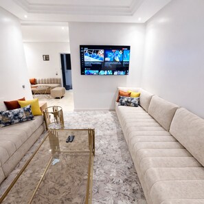 Premium Apartment, 2 Bedrooms | Living area | 42-inch LED TV with satellite channels, TV, DVD player