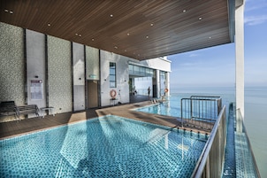 Outdoor pool, open 8:00 AM to 8:00 PM, pool loungers