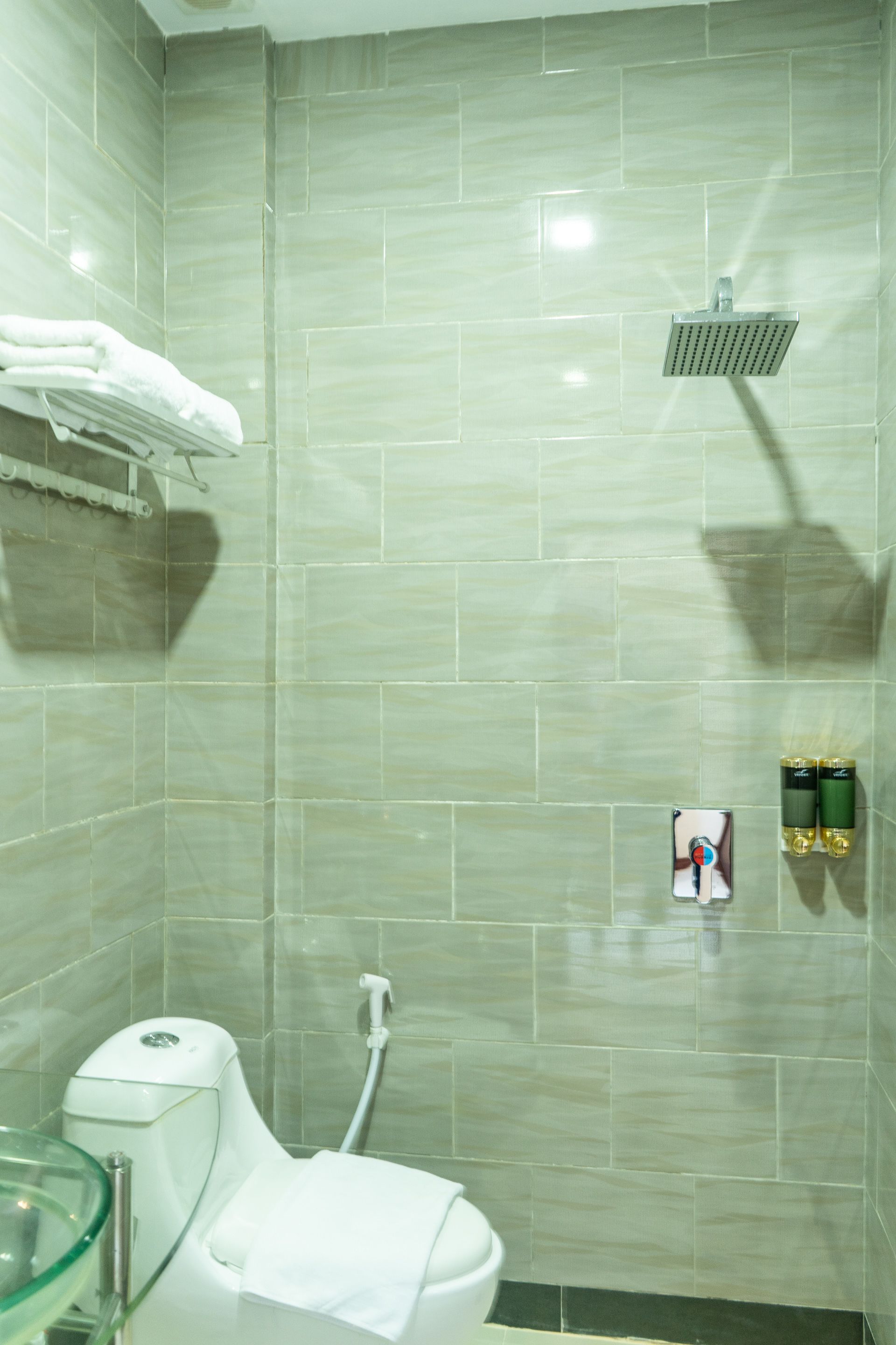 deluxe double room, 1 double bed | bathroom | shower, slippers, towels