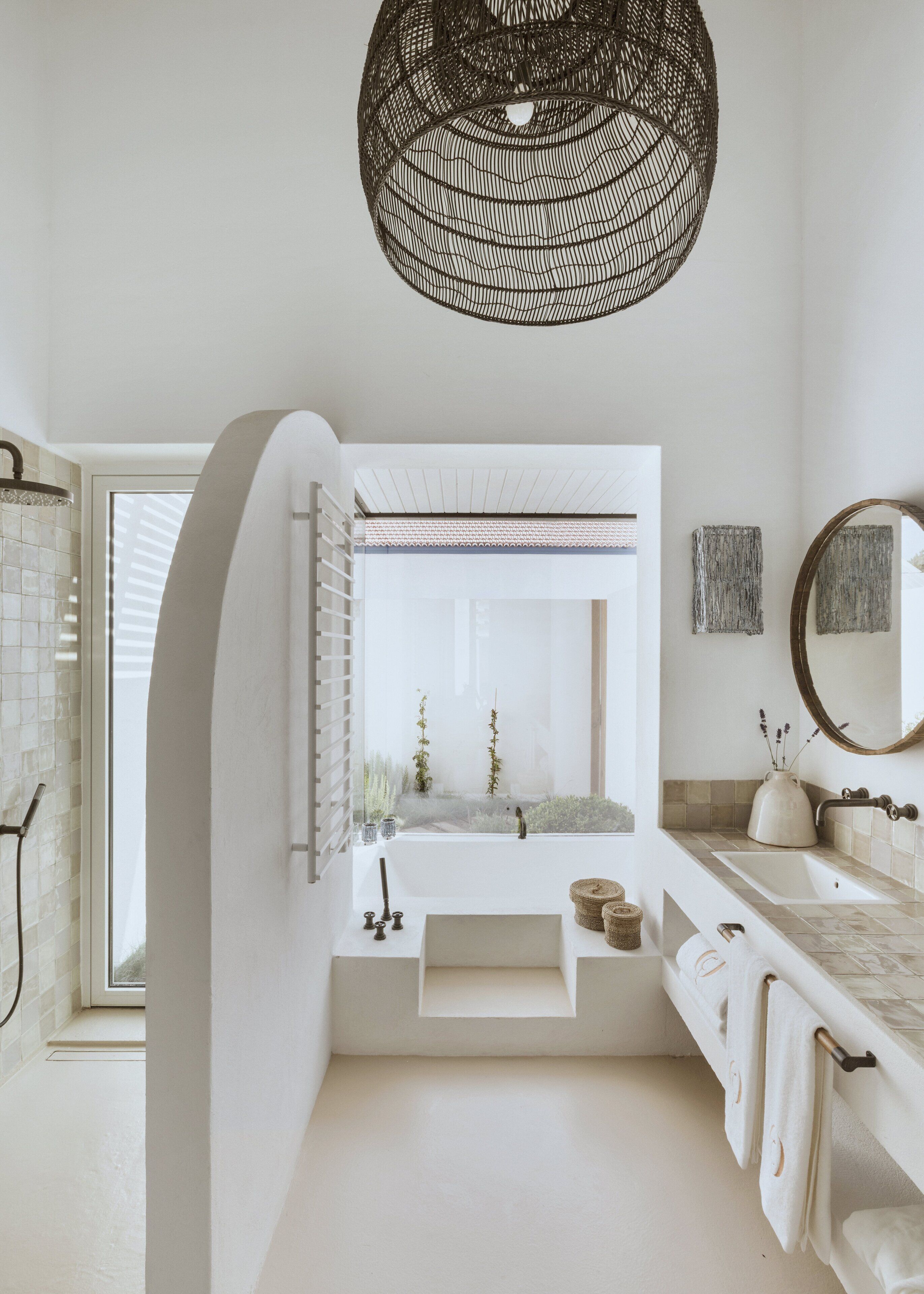 separate bathtub and shower, designer toiletries, hair dryer, bathrobes