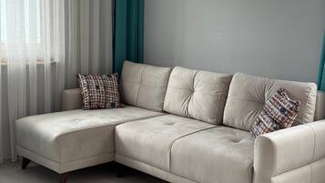 Classic Condo | Living area | 75-inch flat-screen TV with cable channels, heated floors