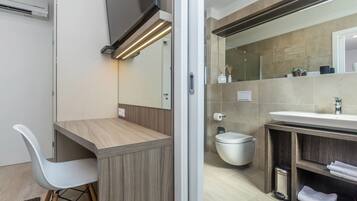 Luxury Apartment, 2 Bedrooms, Sea View, Ground Floor | Bathroom | Shower, rainfall showerhead, hair dryer, bathrobes