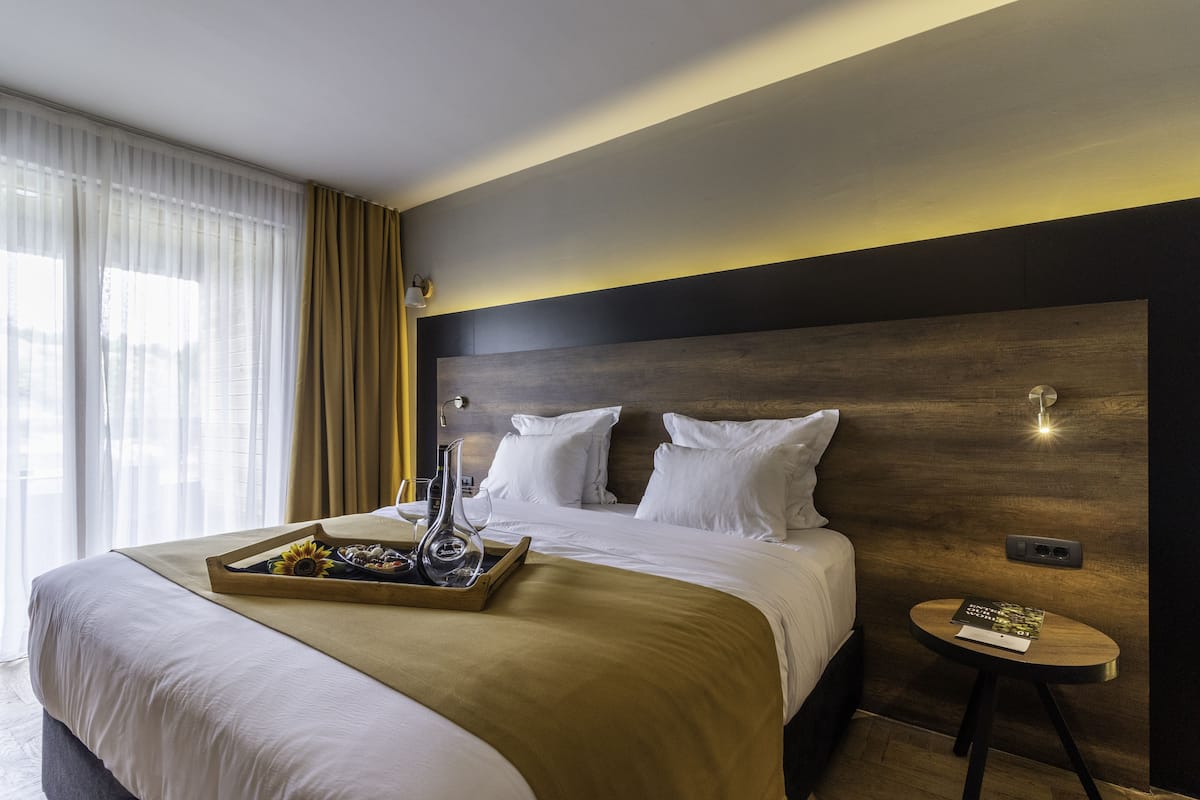 Executive Suite with Arena view | 1 slaapkamer, hypoallergeen beddengoed, een kluis op de kamer
