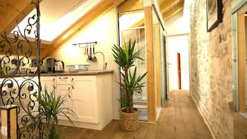 Luxury Loft, 1 King Bed, City View | Private kitchenette | Fridge, stovetop, electric kettle, cookware/dishes/utensils