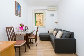 City Apartment, City View | Living room | LCD TV, Netflix