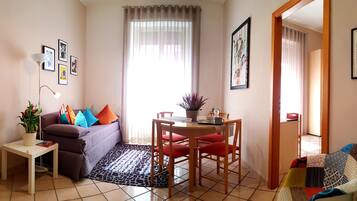 Family Suite, Kitchen | Living area | Flat-screen TV