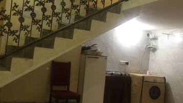 Suite Confort, 1 grand lit | Coin séjour