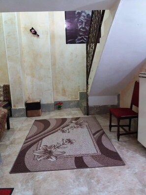 Suite Comfort, 1 Tempat Tidur Queen | Ruang keluarga