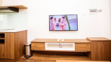 Deluxe Apartment | Living area | LCD TV