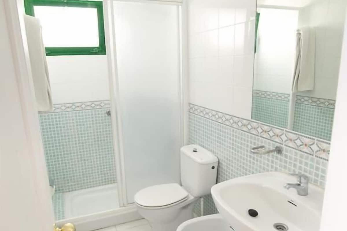 Ducha, bidé y toallas