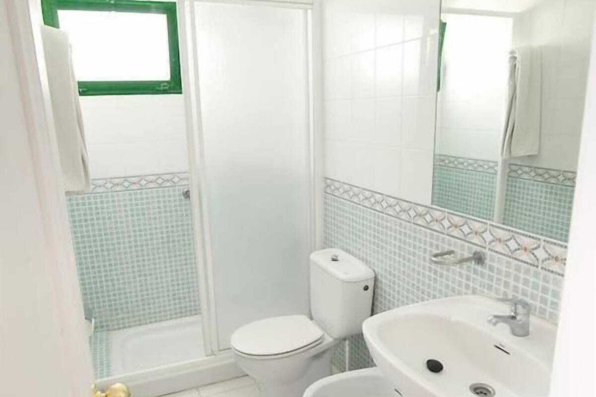 Ducha, bidé y toallas