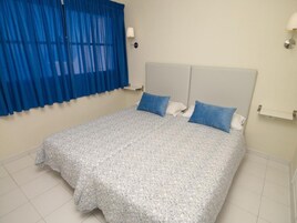 2 bedrooms, blackout curtains, WiFi, bed sheets