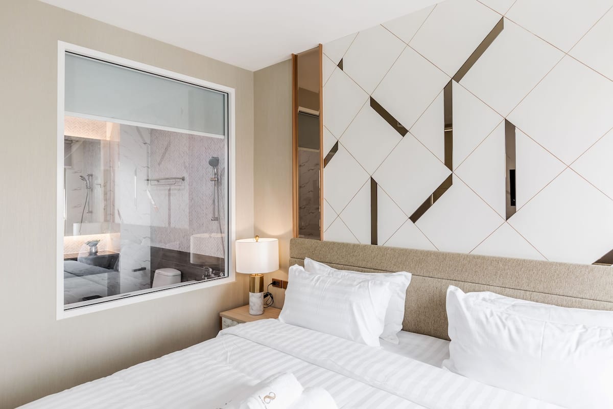 grand deluxe king with city view | premium bedding, minibar, in-room safe, desk