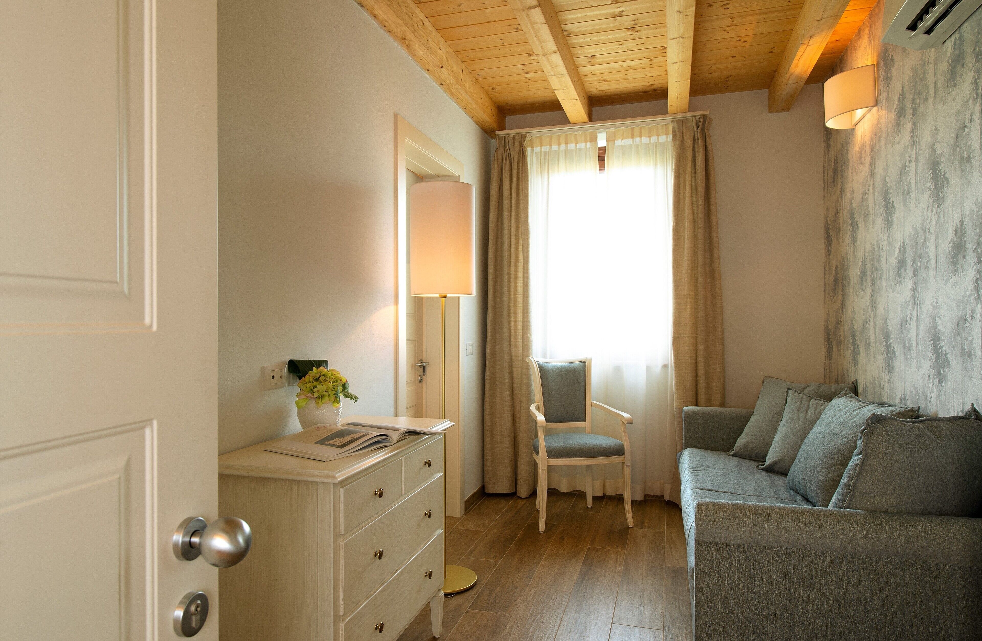 panoramic suite, hill view | living room | 43-inch flat-screen tv with satellite channels, tv