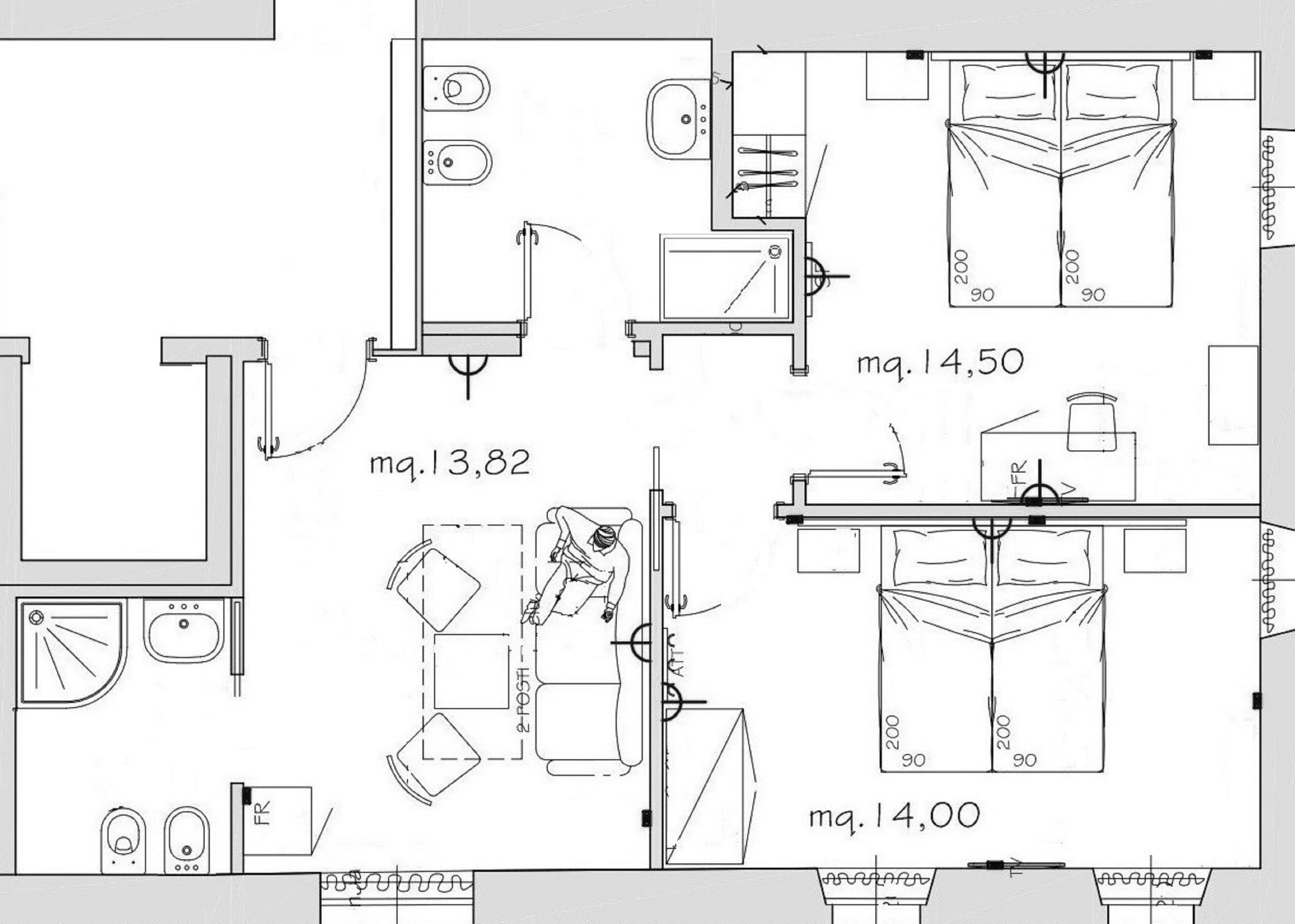 A detailed floor plan of a hotel room with a bathroom, kitchenette, and a bed.