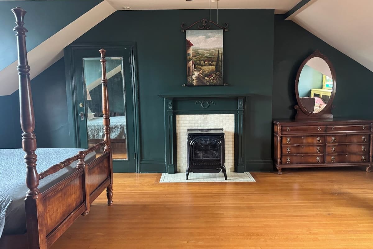 Deluxe Quadruple Room, Courtyard View | Premium bedding, in-room safe, individually decorated