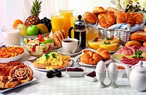 Dagelijks continentaal ontbijt (USD 5 per persoon)