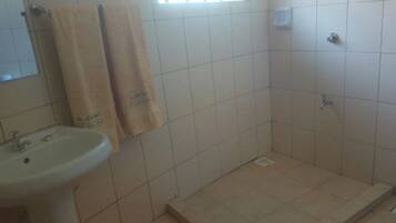 Shower, free toiletries, slippers, towels