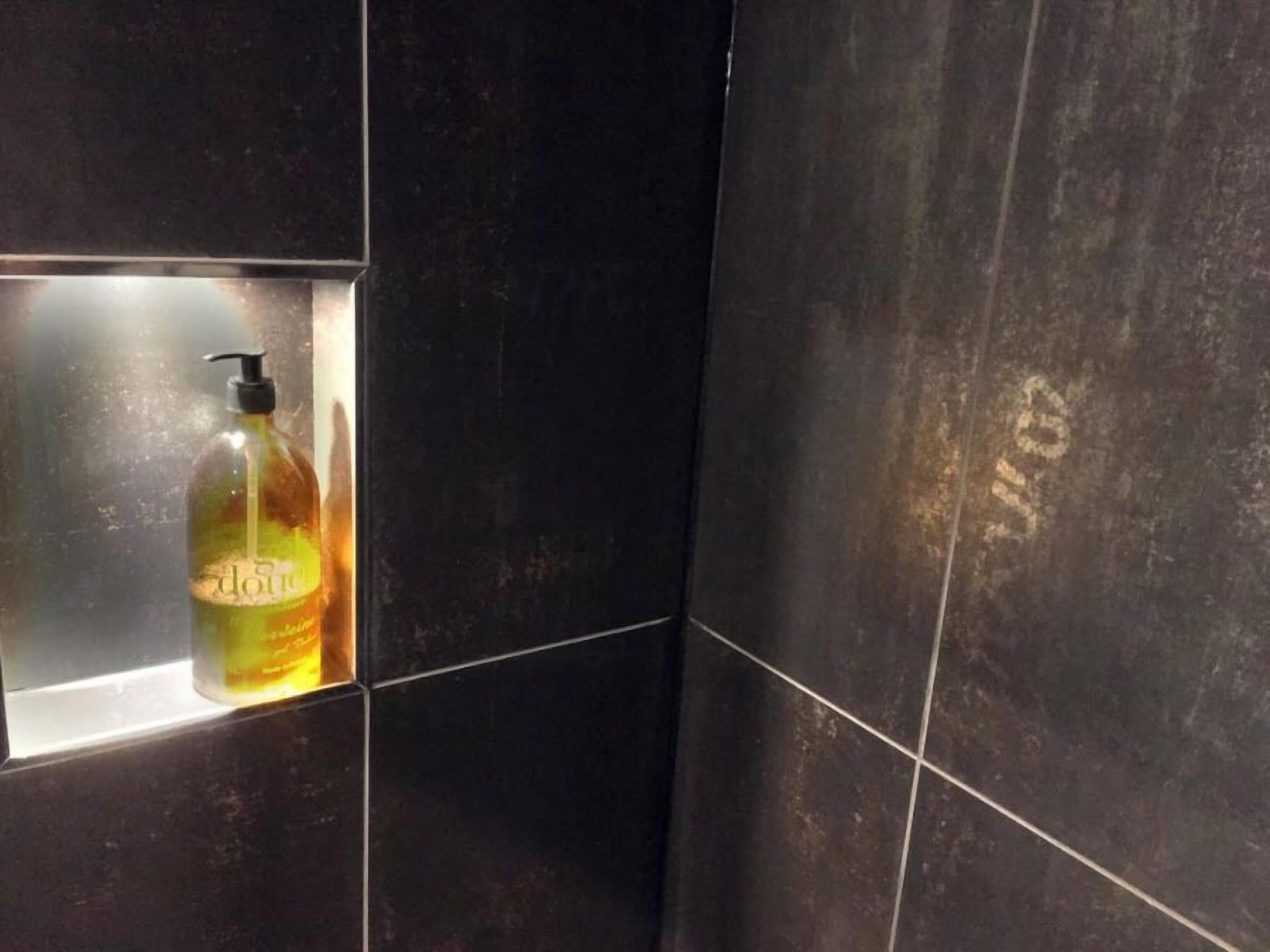 comfort double room | bathroom amenities | shower, rainfall showerhead, free toiletries, hair dryer