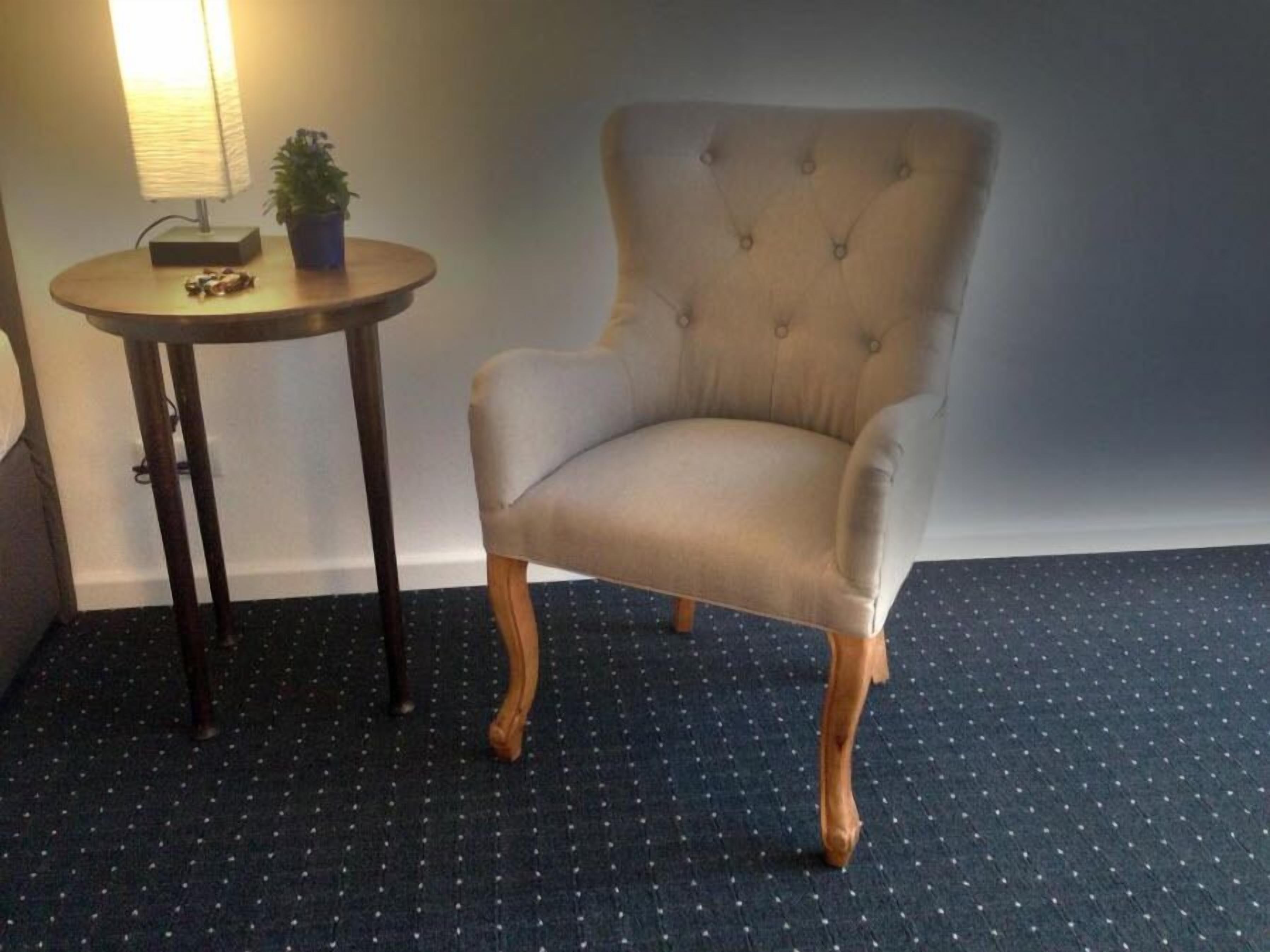 comfort single room | living area | 52-inch flat-screen tv with satellite channels, tv, ipod dock