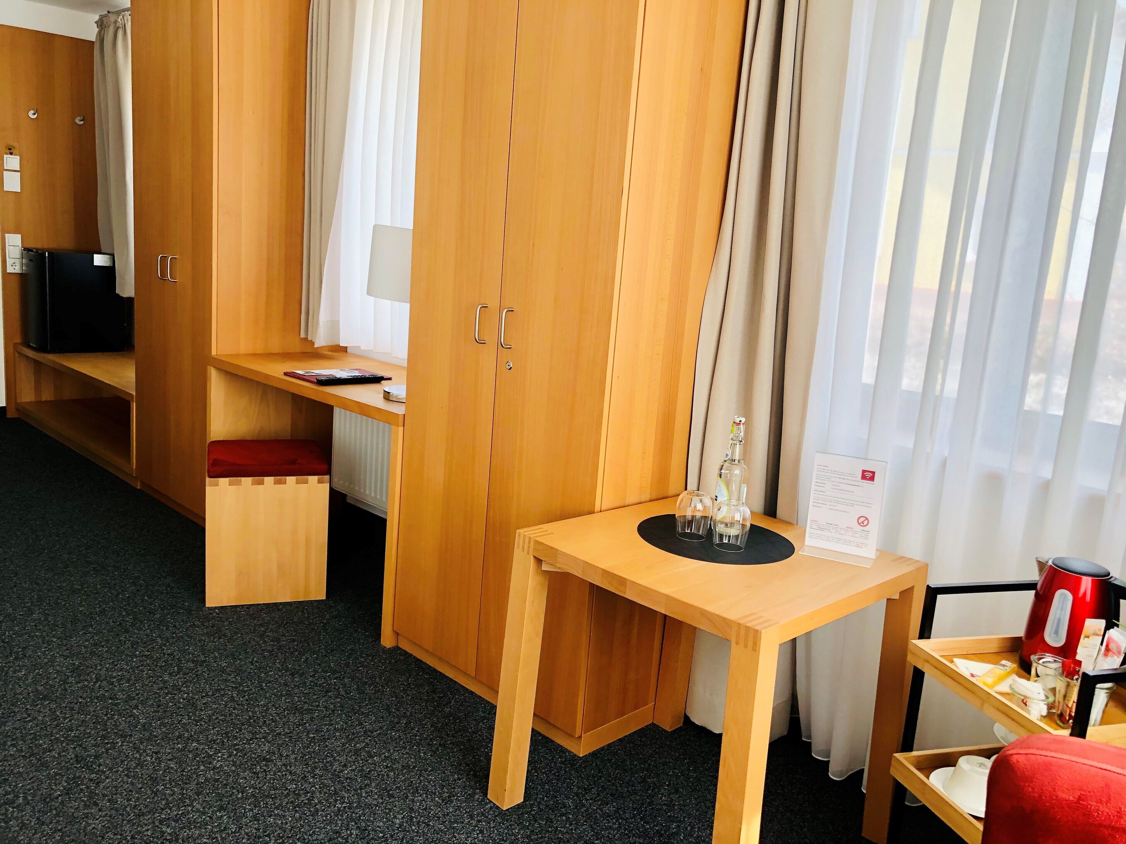 comfort double room, 1 double bed | living area | flat-screen tv