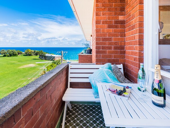 Relax on the balcony with a glass of champagne and take in the breathtaking ocean views.