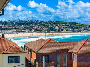 Stroll along the beach and enjoy the lively atmosphere of this charming coastal town.