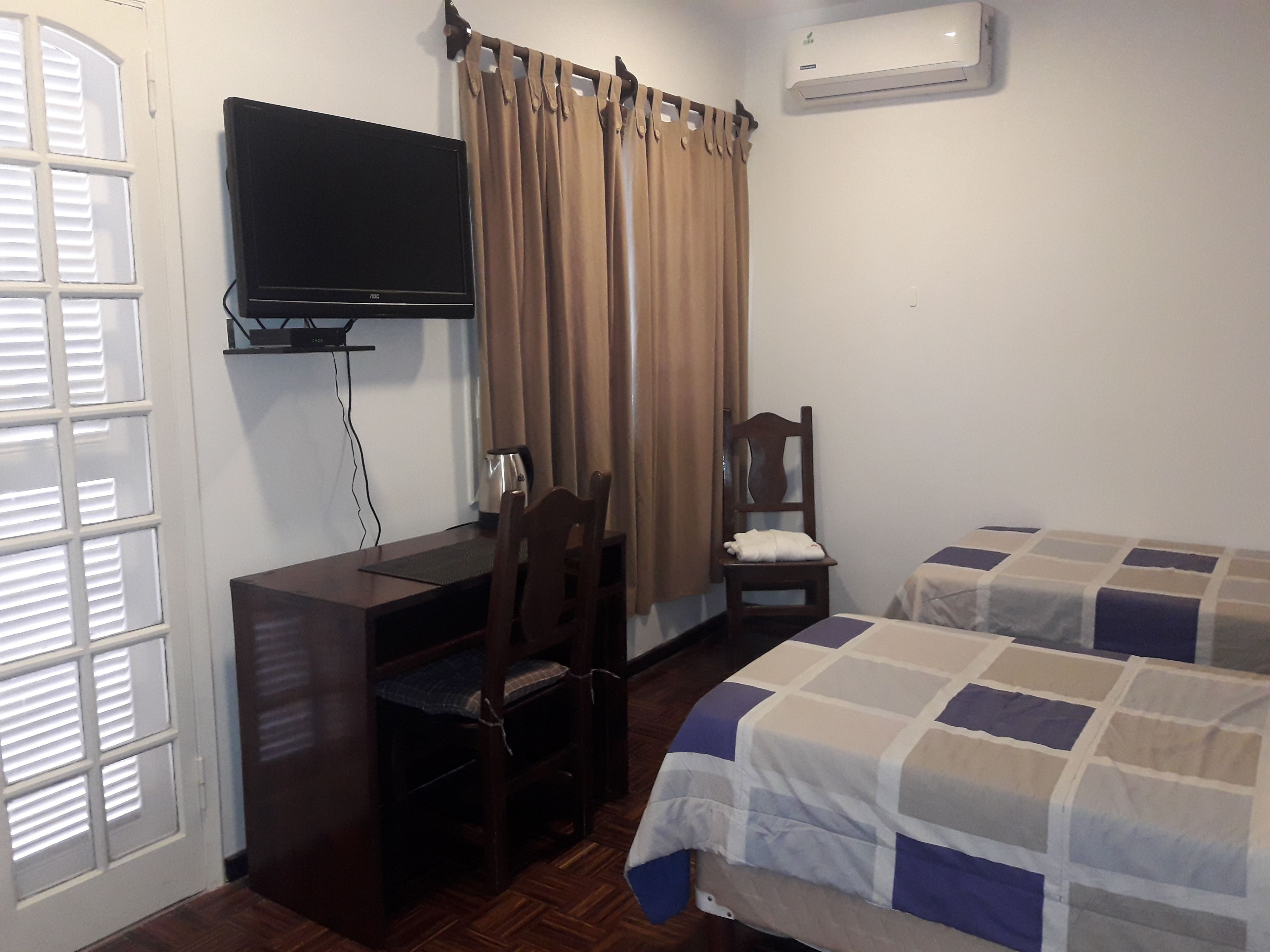 standard double or twin room, 2 single beds, courtyard view | minibar, in-room safe, desk, laptop workspace