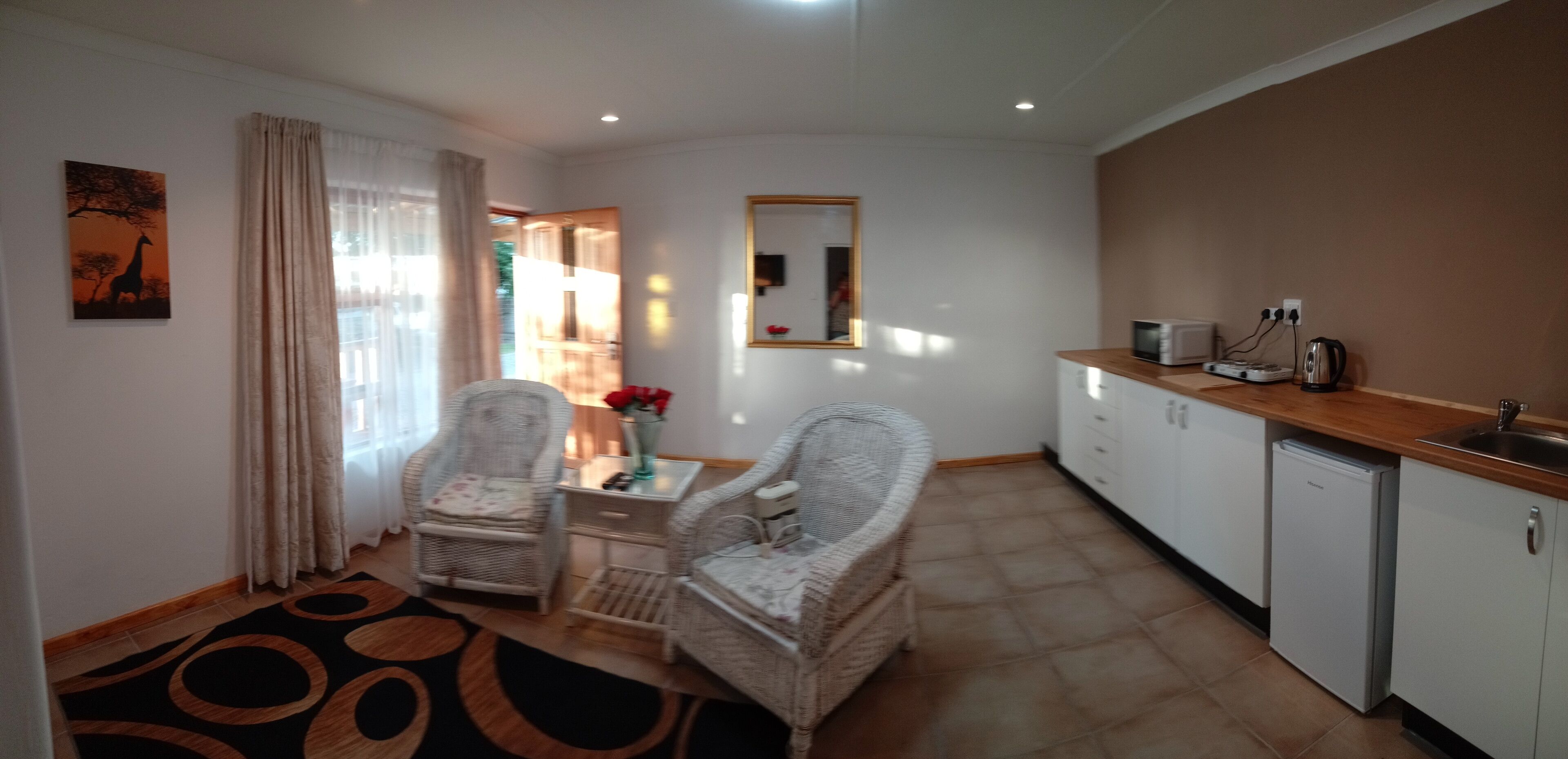 Giraffe suite | Living area | 32-inch Smart TV with satellite channels