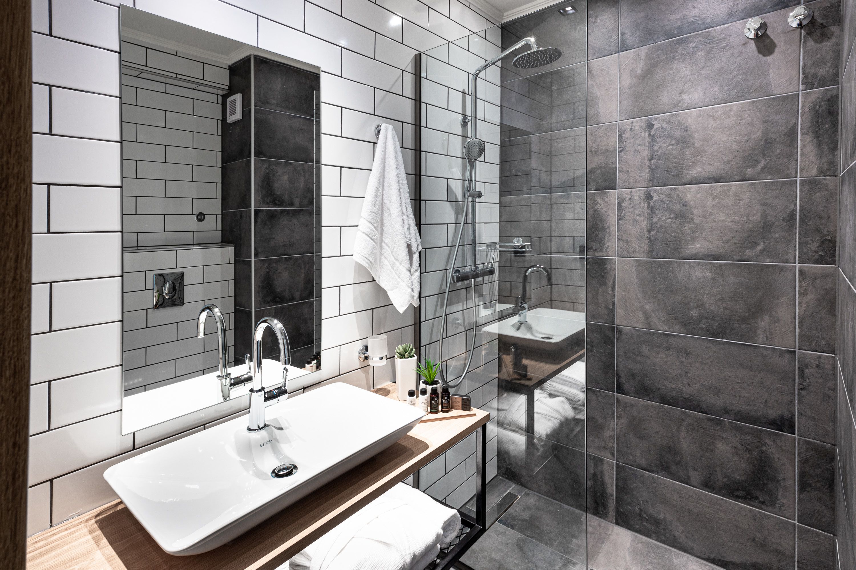 shower, designer toiletries, hair dryer, bidet