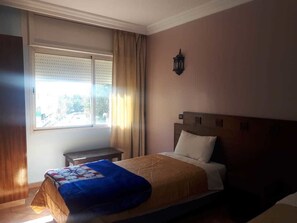 Apartment, 2 Bedrooms | Blackout drapes, rollaway beds, free WiFi, bed sheets - Residence Assaka (Ait Melloul)