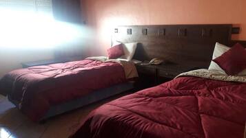 Blackout drapes, rollaway beds, free WiFi, bed sheets