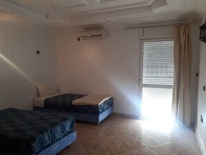 Apartment, 2 Bedrooms | Blackout drapes, rollaway beds, free WiFi, bed sheets - Residence Assaka (Ait Melloul)
