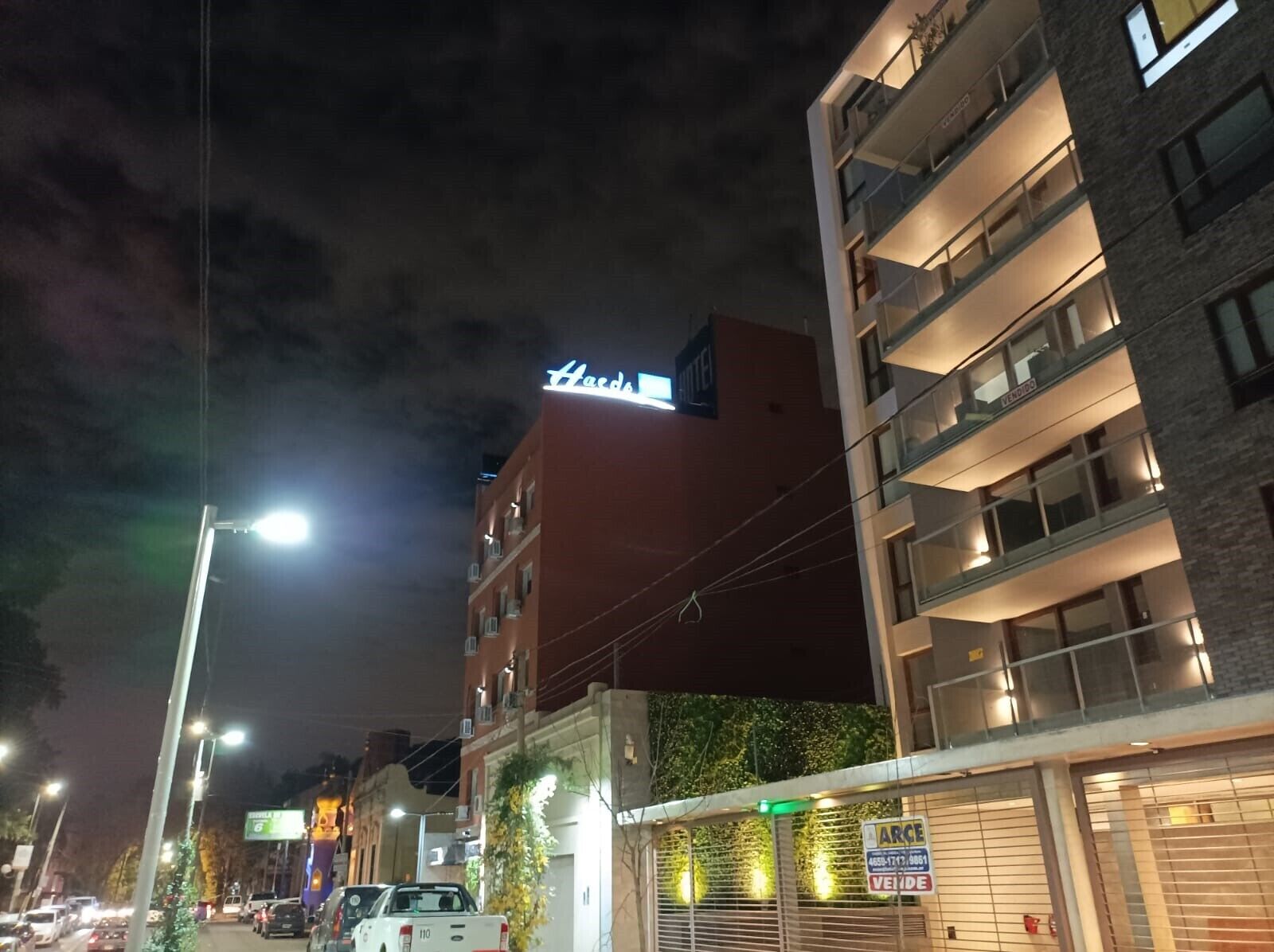A hotel with a sign reading "Hotel".