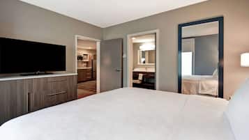 Desk, laptop workspace, blackout drapes, iron/ironing board