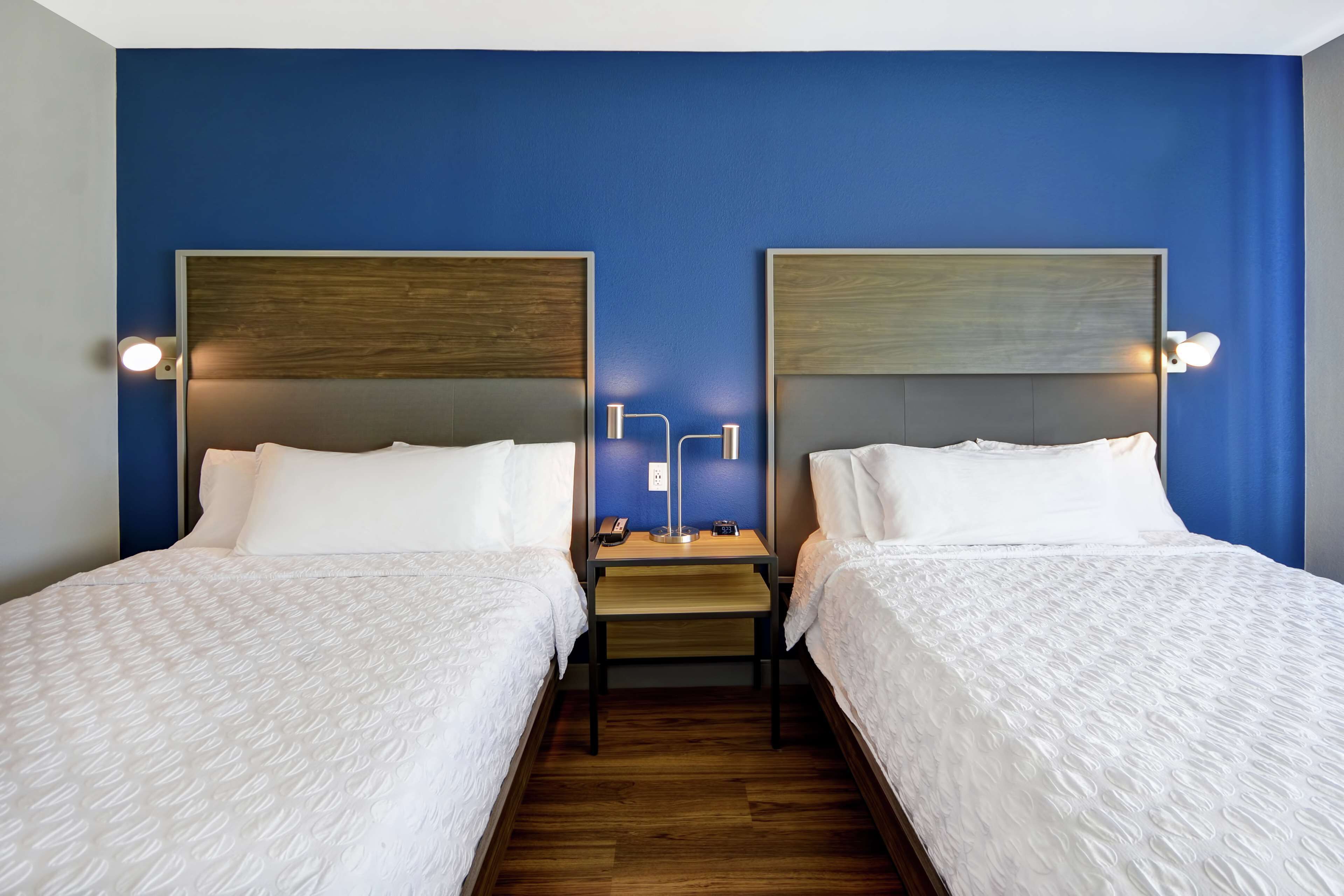 pillow-top beds, desk, blackout curtains, iron/ironing board