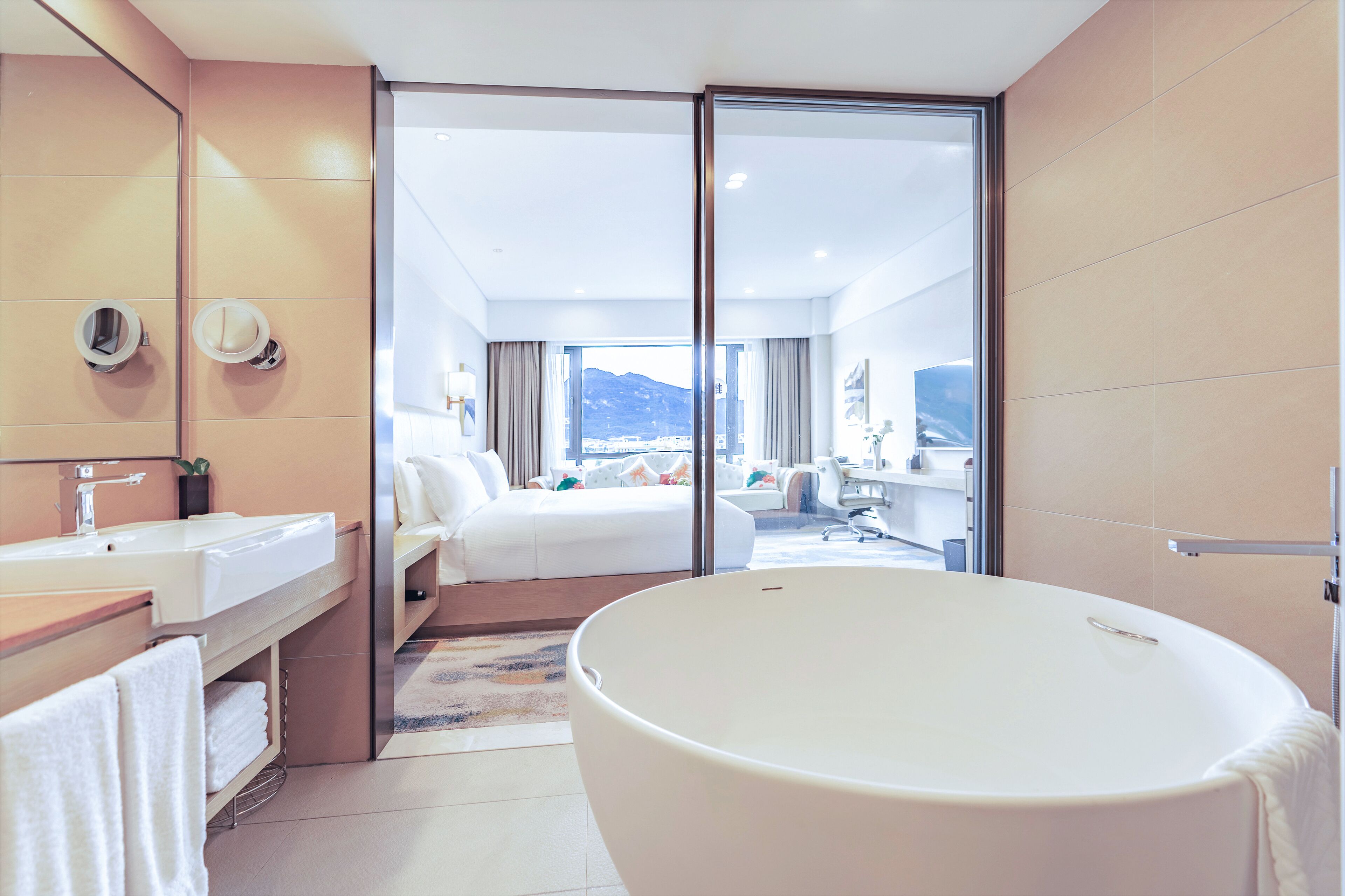 Separate bathtub and shower, rainfall showerhead, designer toiletries