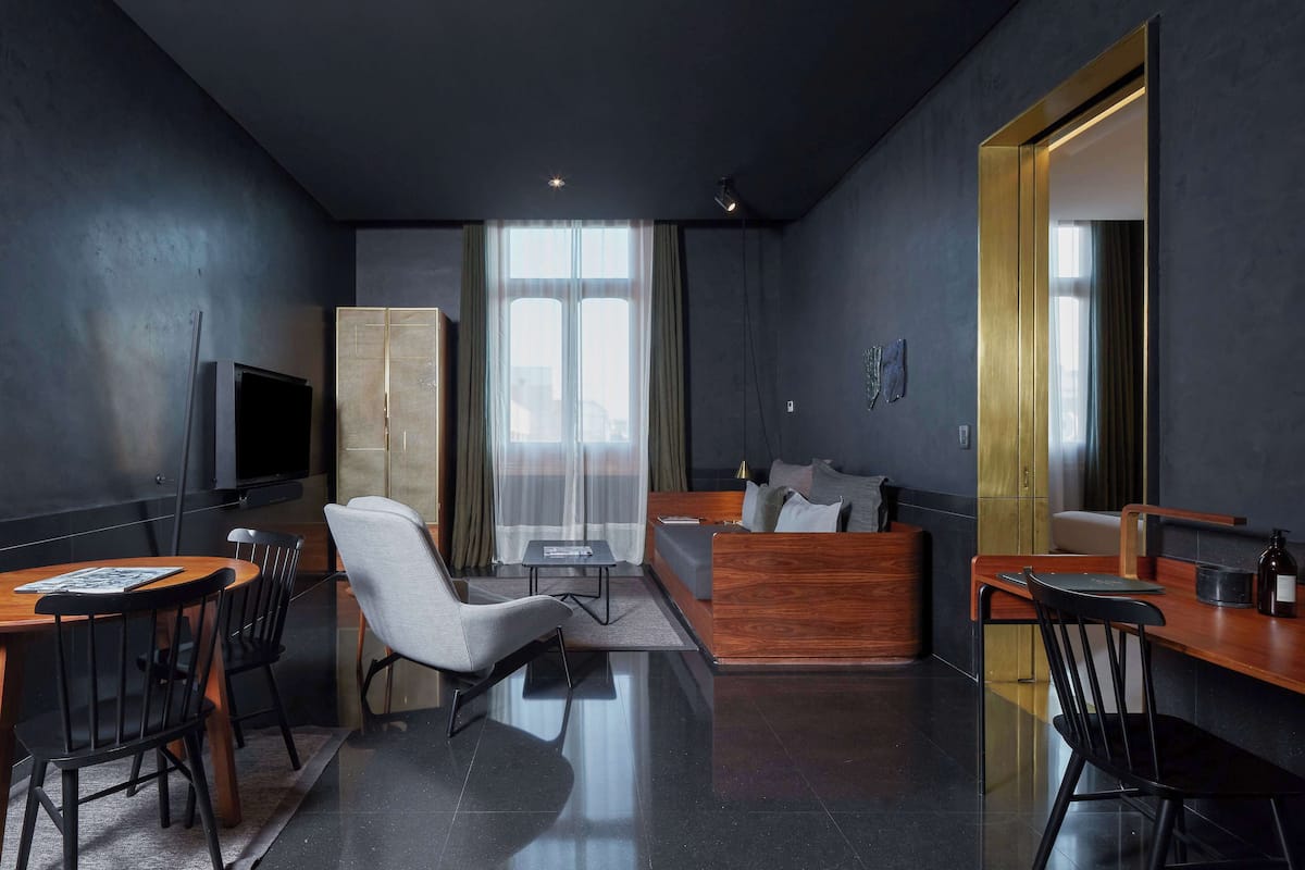 Suite, 1 Bedroom | Living area | 42-inch LCD TV with cable channels, TV, pay films