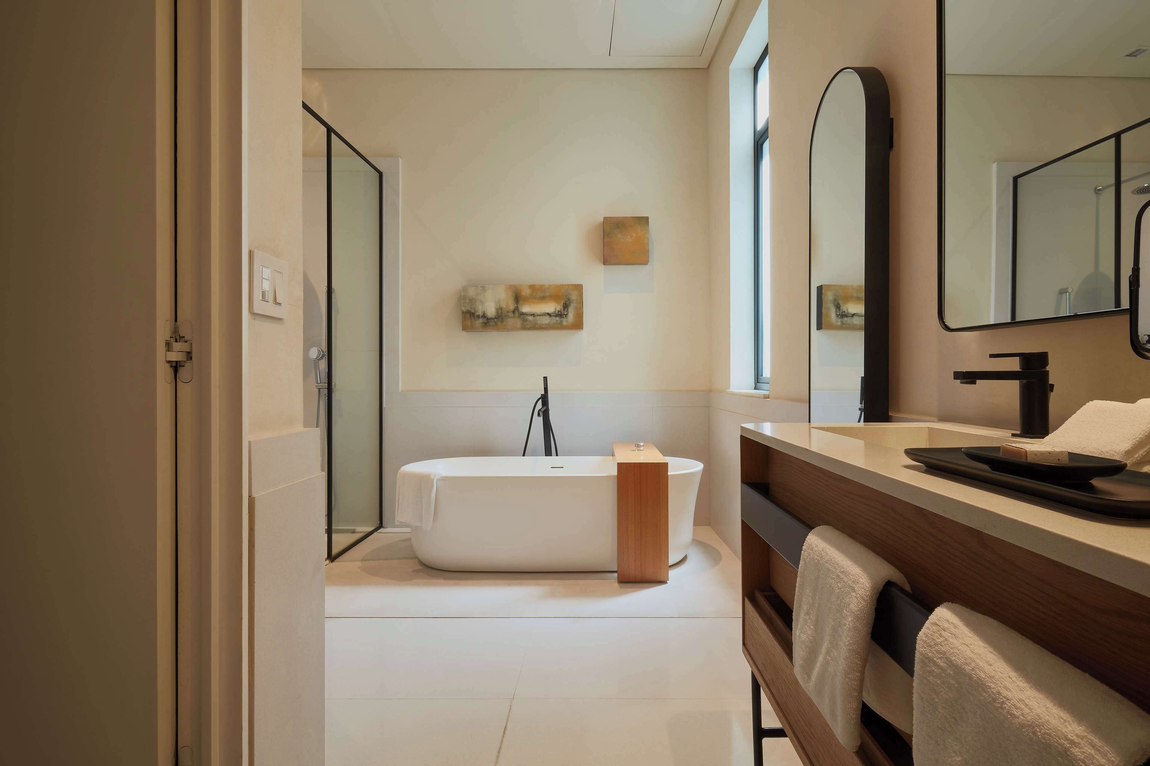 premium suite, 1 king bed | bathroom | eco-friendly toiletries, hair dryer, towels, soap