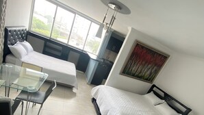 Family Quadruple Room | WiFi (free), bed sheets - Hotel Estefania Princess (Barranquilla)
