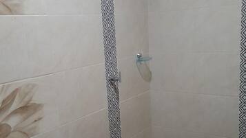 Family Apartment, Multiple Beds, Ocean View | Bathroom | Shower, towels, soap