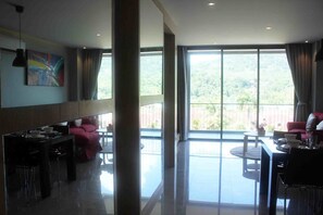 Appartement Standard, 2 grands lits, vue jardin | Coin séjour