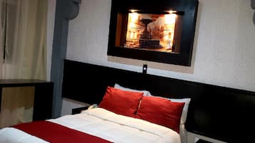 Blackout curtains, iron/ironing board, free WiFi, bed sheets