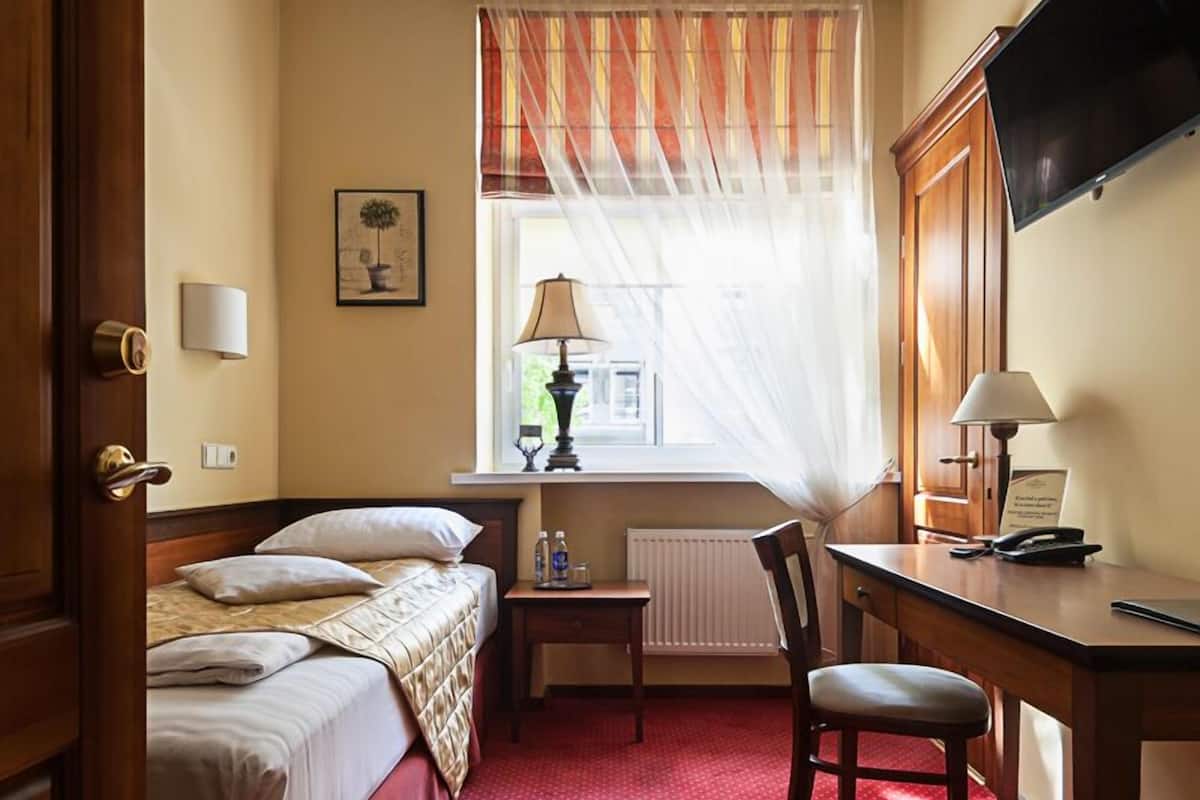 Economy Single Room, City View | 1 bedroom, in-room safe, desk, blackout drapes
