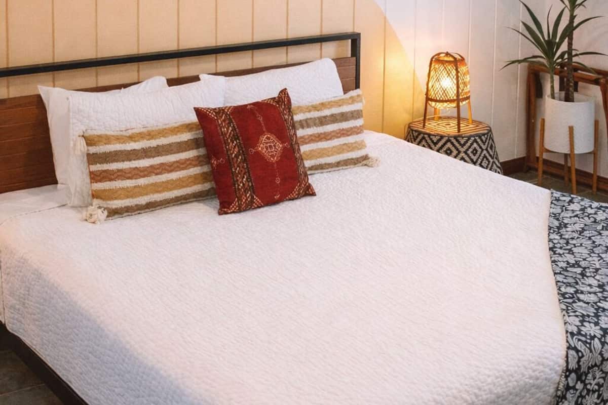 Deluxe King w/patio (Room 7) | Individually decorated, individually furnished, iron/ironing board