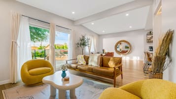 Signature Villa | Living room | Smart TV, books