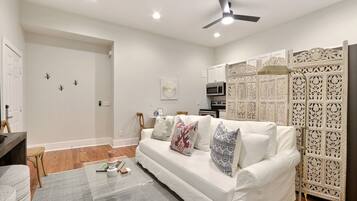 Apartment, Multiple Beds | Living area | Flat-screen TV