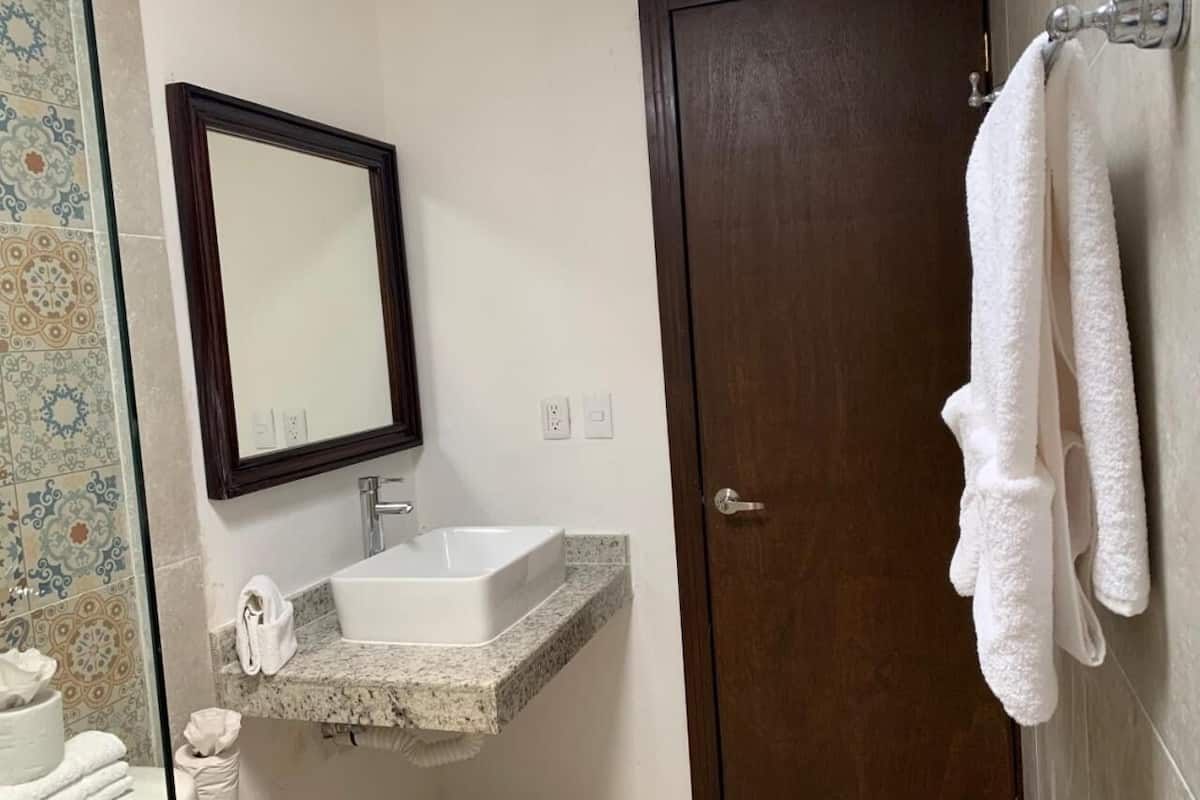 shower, towels, soap, shampoo